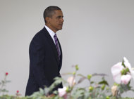 President Barack Obama leaves the White House, Friday, Sept. 2, 2011, to board Marine One, en route to Camp David. (AP Photo/Carolyn Kaster)