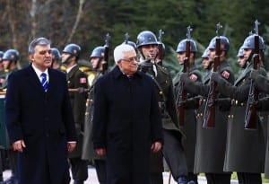 Palestine's president M. Abbas reviews Turkish honor guard upon arrival in Turkey.