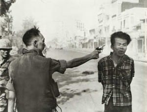 The unpunished war criminal shooting this prisoner was a puppet Viet military in the service of the US. He migrated to the US and became a restaurateur in the Washington DC area. 