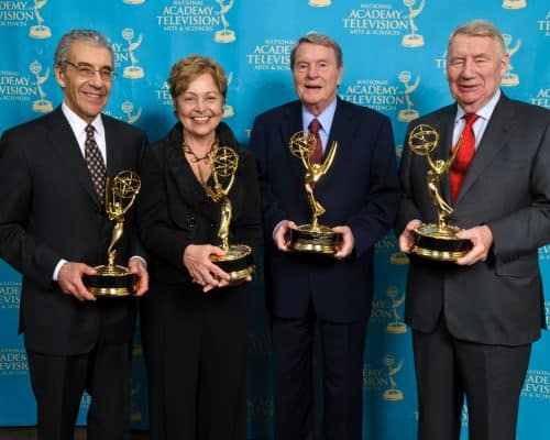 The PBS Newshour crew receiving some awards. For what? 