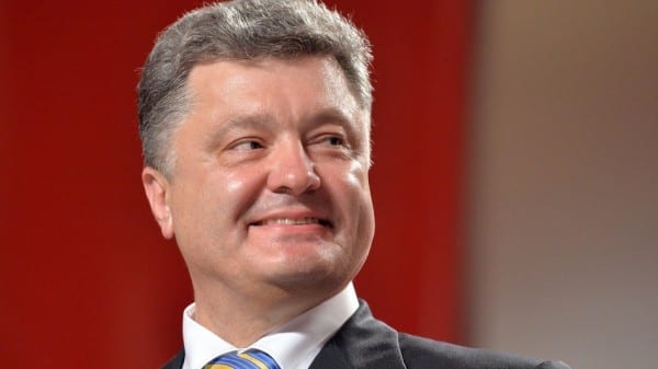 Petro Poroshenko smiles during a press-conference in Kiev during the election's evening on May 25, 2014. Western-friendly chocolate baron Petro Poroshenko claimed victory Sunday in a presidential election seen as key to dragging Ukraine out of its worst crisis since independence.