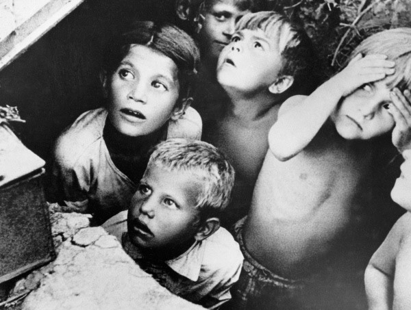 Children take shelter drawing an air raid, near Minsk, 1941, part of a largely unseen Russian archive. 