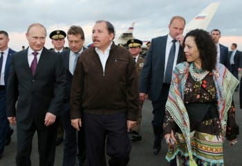 The Russian leader being welcomed by Nicaragua's President, Daniel Ortega and other Nicaraguan dignitaries at Augusto Sandino Airport. (July 2014)