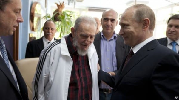 Russi'a Pres. Putin greets the legendary leader of Latin American revolution, Fidel Castro, in Havana, during his tour in July 2014. 