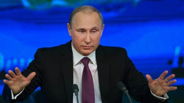 Vowing never to let the West defang his proud nation, President Vladimir Putin promised Thursday to fix Russia's economic woes within two years by diversifying and voiced confidence that the plummeting ruble will soon recover.