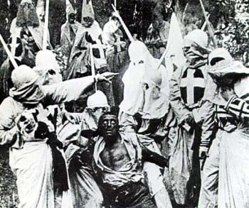 A "justified lynching" as depicted in Birth of a Nation. The victim to be hanged is a white actor in blackface. (Wikipedia)