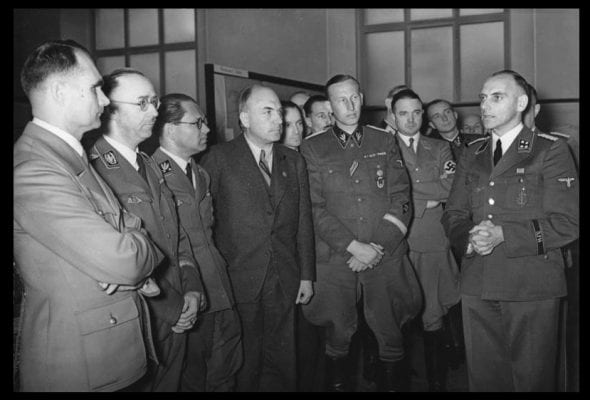 Top Nazis being briefed about operations on the Eastern Front. From left to right: Rudolf Heß, Heinrich Himmler, Philipp Bouhler, Fritz Todt and Reinhard Heydrich, listening to Konrad Meyer at a Generalplan Ost exhibition, 20 March 1941. Apparently the Times and Co. —to their eternal shame—now would like us to believe the peaceloving Third Reich was attacked by the brloodthirsty Russian horde.  