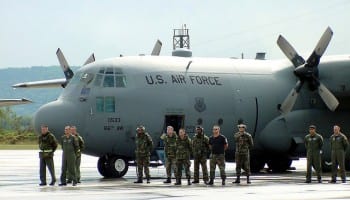 Members of the 37th Airlift Squadron and 86th Maintenance Squadron at Ramstein Air Base, Germany, observe three minutes of silence Sept. 14 to remember victims and 