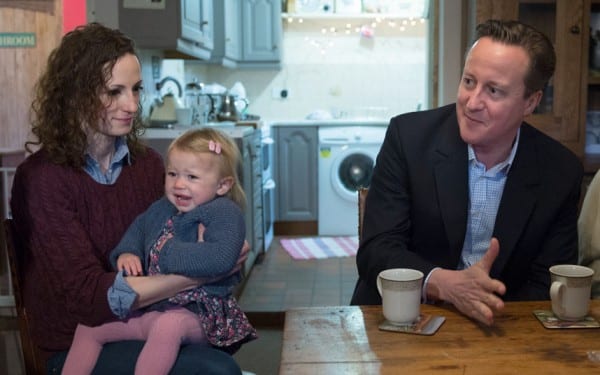 Cameron pressing plebeian flesh. Kitchen photo op, the stock in trade of politicians in a managed democracy. 