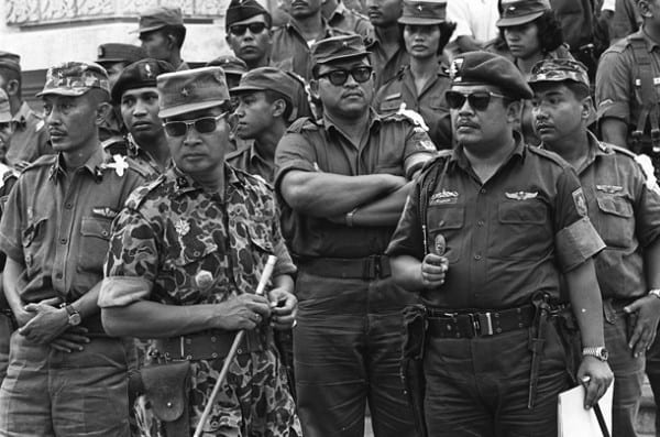 Suharto surrounded by other military mafiosi. Whenever something dirty needs to be done the CIA man knows where to get it. 