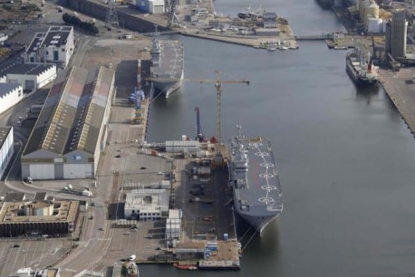 The two Mistral-class helicopter carriers Sevastopol (Bottom) and Vladivostok are seen at the STX Les Chantiers de l'Atlantique shipyard site in Saint-Nazaire, western France, May 25, 2015. REUTERS/Stephane Mahe