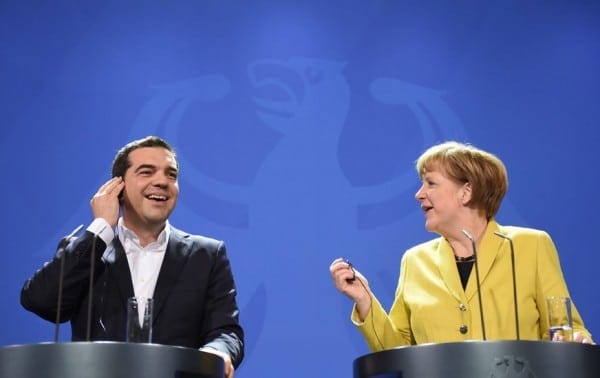 epa04676325 German Chancellor Angela Merkel (R) and Greek Prime Minister Alexis Tsipras (L) inform the public about their previous talk during a press conference in the Federal Chancellery in Berlin, Germany, 23 March 2015. Tsipras is expected to present a list of reforms, hoping to unlock bailout funds to prevent Greece from running out of cash next month, Greek government sources said.  EPA/BERND VON JUTRCZENKA