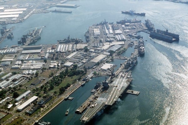 SUBIC BAY, The Philippines. One of the oldest imperial military outposts. The nuclear-powered aircraft carrier USS ENTERPRISE (CVN-65) is in the foreground.