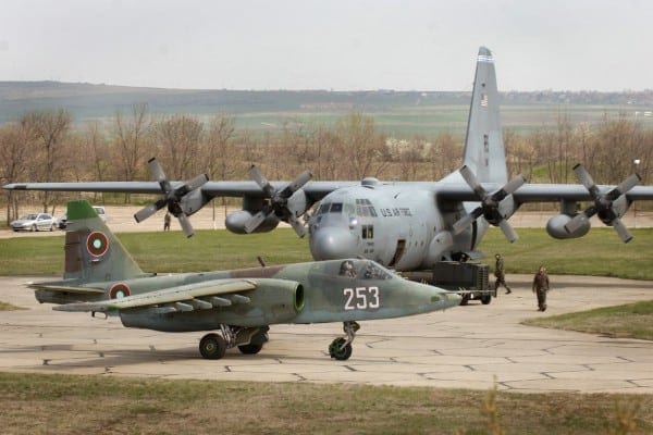 A Bulgarian air force SU-25 Frogfoot aircraft taxis past a U.S. Air Force C-130E Hercules aircraft at Bezmer Aviation Base, Bulgaria, March 31, 2008, prior to flying a sortie for exercise Thracian Spring 2008. The annual bilateral training exercise between the United States and Bulgaria provides training and improves interoperability between the two nations. (U.S. Air Force photo by Master Sgt. Scott Wagers) (Released)