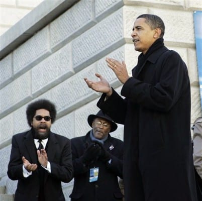 ** CAPTION CORRECTION, CORRECTS SPELLING OF LAST NAME TO OBAMA, NOT OBABMA ** Democratic presidential hopeful, Sen. Barack Obama, D-Ill., right, is applauded by Princeton Professor Cornel West, far left, as he takes the stage at the Martin Luther King Day March to the Dome in Columbia, S.C., Monday, Jan. 21, 2008. (AP Photo/Elise Amendola)