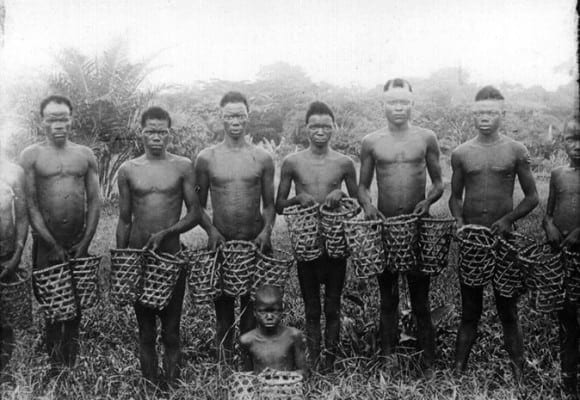 Congolese slaves, employed in backbreaking rubber production.