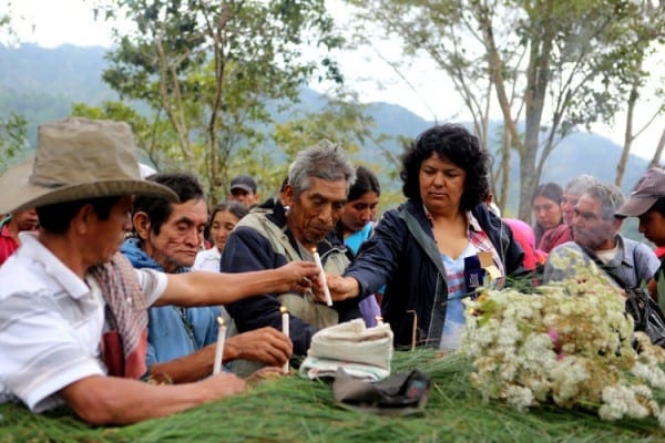 Berta Caceres in the Rio Blanco region of western Honduras where she, COPINH (the Council of Popular and Indigenous Organizations of Honduras) and the people of Rio Blanco have maintained a two year struggle to halt construction on the Agua Zarca Hydroelectric project, that poses grave threats to local environment, river and indigenous Lenca people from the region. She gathered with members of COPINH and Rio Blanco during a meeting remembering community members killed during the two year struggle.