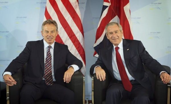 epa01031620 British Prime Minister Tony Blair (L) and U.S. President George W. Bush speak together on June 7, 2007 in Heiligendamm, Germany, where G8 world leaders are holding their first full day of talks. EPA/Peter Macdiarmid/POOL