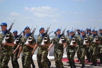 Irish Army soldier peacekeepers while serving with UNIFUL in Lebanon on September 19, 2013. Na href="https://www.flickr.com/photos/dfmagazine/9840610256/sizes/l/">Irish Defence Forces. (CC BY 2.0) 