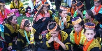 Women and girls from the Kalash community still wear colourful traditional costumes. Image: Ground Report via Flickr