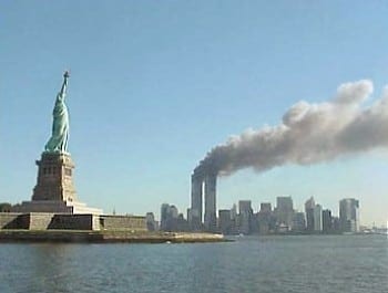 The World Trade Center’s Twin Towers burning on 9/11. (Photo credit: National Park Service)