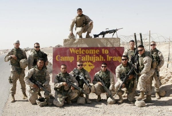 US soldiers posing for a souvenir in Fallujah conquered ground.