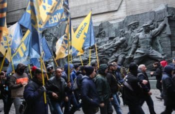 Azov's Civic Corps marches through downtown Kiev.